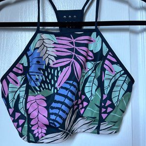 NWOT. JoyLab high neck racerback sports bra. Fun floral and navy. Size Medium.